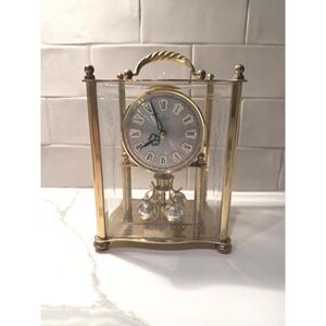 Vintage Hamilton Brass Carriage Anniversary Clock with a quartz movement
